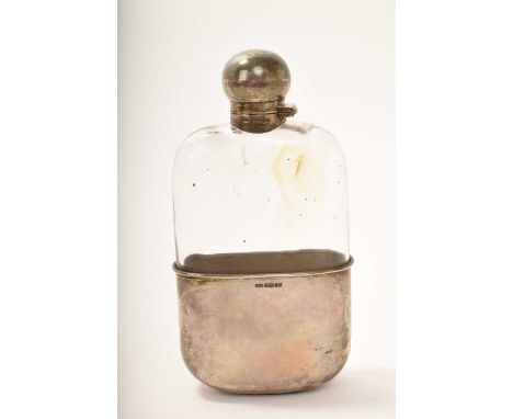 Victorian silver and glass hip flask, with plain glass body, the silver lid with engraved family crest and bayonet fitting, w