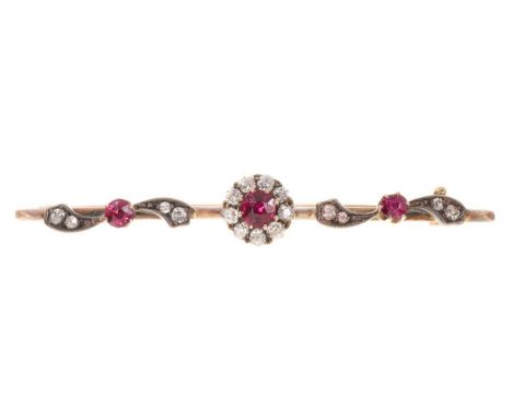 Victorian ruby and diamond brooch, the central flower head cluster with a mixed cut ruby measuring approximately 4.6mm diamet