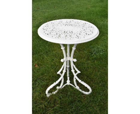 Victorian aesthetic period cast iron garden table, white painted with circular top on angular base, 52cm diameter x 73cm high