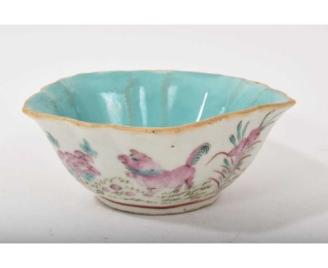 Chinese famille rose bowl, late 19th/early 20th century, decorated with foo dogs, with turquoise interior, marked to base, 11