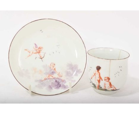 Rare Chelsea coffee cup and saucer, circa 1755, painted with children and putti, moulded branch and flower handle, red-lined 