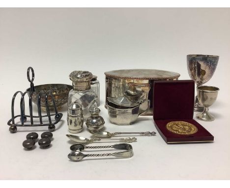 Small collection of miscellaneous silver, including four drawer knobs, condiments, toast rack, embossed bowl, pair apostle sp