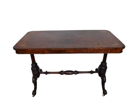 Victorian burr walnut stretcher table, the rounded rectangular top inlaid with boxwood ornament on standard ends and splayed 