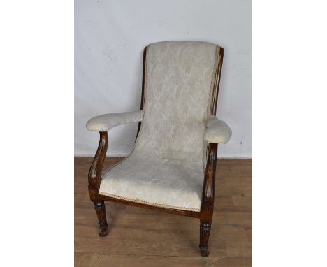 Regency beech framed library chair, raised on reeded legs and castors