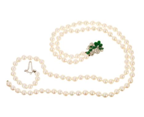 Cultured pearl two-strand necklace with a jade and diamond cluster clasp in white gold setting, 42cm long