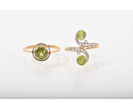 Edwardian peridot and diamond crossover ring with scroll design on 14ct gold shank, ring size N and an Edwardian peridot sing