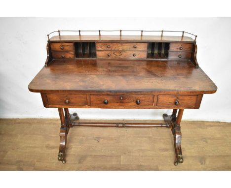 Regency rosewood writing desk, the superstructure with gallery and fitted with pigeonholes and drawers, with three frieze dra