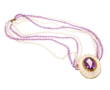 Amethyst and frosted glass gold mounted necklace, the central oval mixed cut amethyst in a reeded frosted glass mount set in 