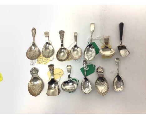Collection of thirteen Georgian and later silver caddy spoons of different designs (various dates and makers). All at approxi