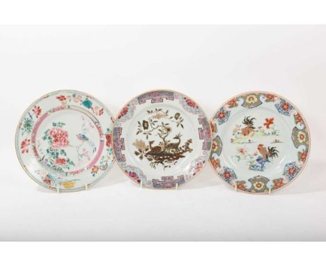 Three 18th century Chinese famille rose porcelain plates, decorated with deer, cockerels, and birdsAll with some small chips 