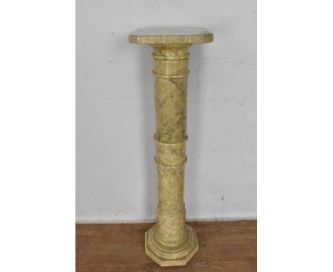 Green marble pedestal, with canted square marble top on turned column and hexagonal plinth base, 102cm high 