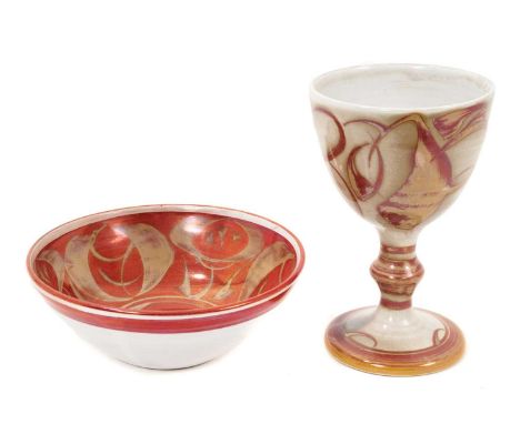 Alan Caiger-Smith, bowl and a goblet, decorated with red lustre glaze, inscribed marks to bases, the bowl 13.5cm diameter and