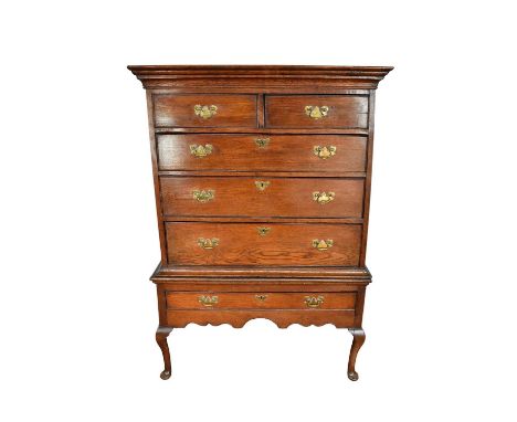 Early 18th century oak chest on stand, with moulded cornice and two short over three long graduated drawers, the base with on