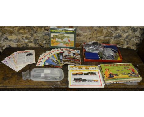 A box of Meccano, to/w instruction manual, Meccano Magazine (1970's), etc.