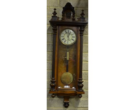 A late 19th century German kingwood and walnut 8-day regulator wall clock, the white ceramic dial with Roman numerals and dro