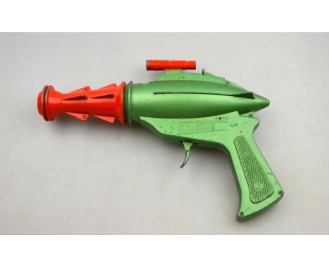 A Lone Star Product 'Stingray' cap-gun green with red muzzle and sight Condition Report Light wear, unboxed