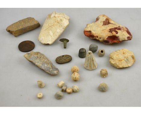 A quantity of archaeological findings including axe-heads, bullets, weights, coin etc (box)