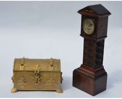 A Victorian carved walnut miniature longcase clock with brass dial (1876 patent), 33 cm, to/w a cast brass domed casket (2)