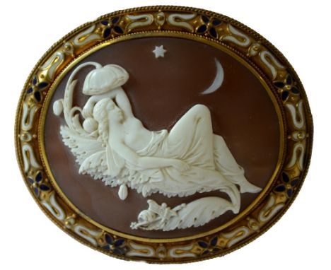 A fine, large Victorian oval shell cameo of Titania beneath the moon and star, in bloomed gold mount having blue and white en
