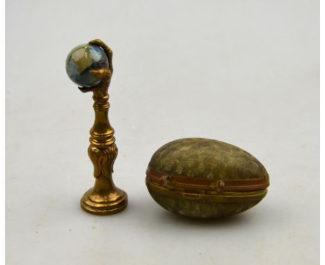 A brass desk-seal, the finial modelled with an agate marble held in a bird's claw, to/w a late Victorian silver thimble, Birm