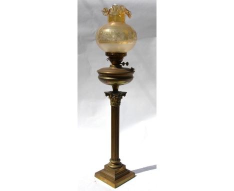 A Victorian cast brass Corinthian column style oil lamp with champagne glass shade, raised on a square stepped base, 90 cm hi