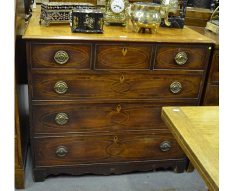 A 19th century inlaid mahogany chest of four long graduated cockbeaded drawers, raised on black bracket feet united by a shap