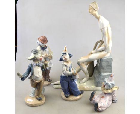 Four Lladro porcelain figures of clowns to/w a Nao figure of Pierrot (5) Condition Report All good condition