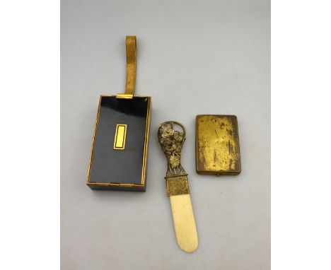 A lady's Art Deco gilt brass and black lacquered vanity/cigarette case by Park Lane LSM, to/w an Ansonia Watch Co. pocket sun