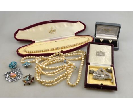 A collection of vintage jewellery including highly stylised Art Deco white paste clip, paste-set brooch and earrings, marcasi