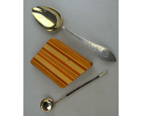 A large Danish .826 standard serving spoon with gilt bowl and engraved stem, C. F. Heise, 36 cm long, to/w a set of New Zeala