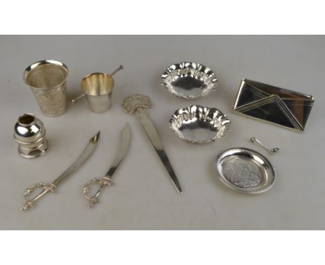 A selection of Egyptian .900 grade small items, including two shot-beakers, business-card holder, three letter knives, three 