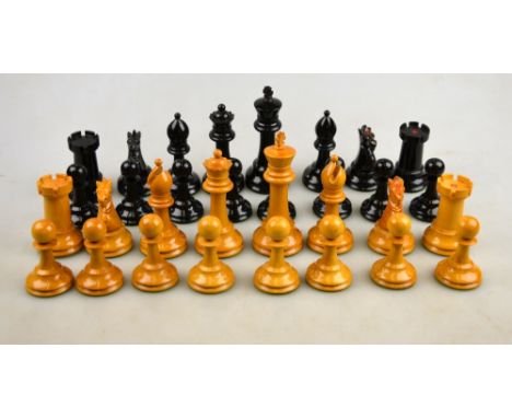 A Staunton turned wood chess set, the rooks stamped with a crown, in mahogany box, King 9 cm, to/w a parquetry inlaid chess-b