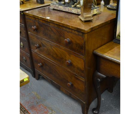 A 19th century mahogany chest of three long graduated drawers raised on splayed bracket feet united by a shaped apron