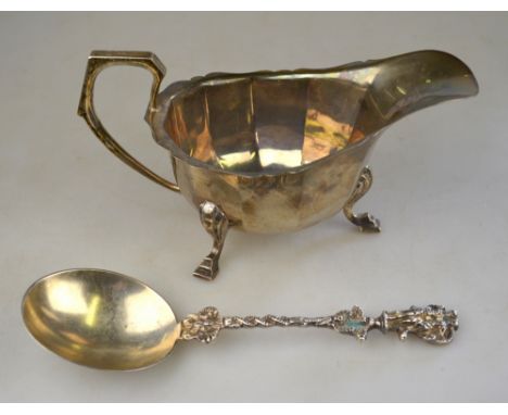 An unusual Victorian silver serving spoon in the Continental manner, the finial worked as a skeletal couple, Henry Stratford,