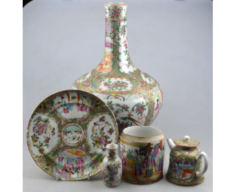 A Chinese Canton famille rose bottle vase, 33 cm h. to/w a similar small teapot, cylindrical jar, plate and two small vases, 