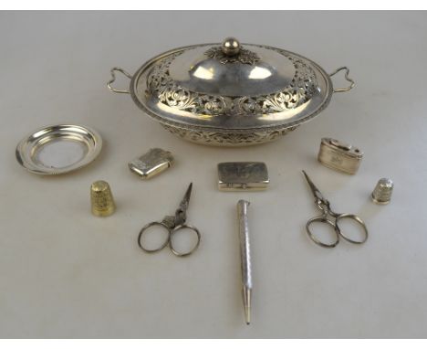 A 19th century Continental unmarked oval pierced bowl and cover, to/w a .800 grade small dish, a sterling propelling pencil, 
