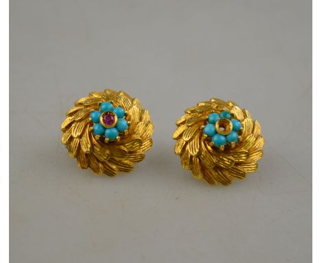 A pair of yellow metal cluster-style earrings set with ruby and turquoise within a leaf circlet, stamped Italy K18, approx 14