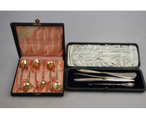 A cased set of six Scandinavian parcel gilt coffee spoons, to/w a Victorian cased shoe horn and glove stretchers with silver 