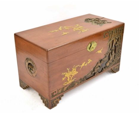Decorative 20th century Chinese camphor wood trunk, with deep relief figural carving, 40" wide, 23" high, depth 20"