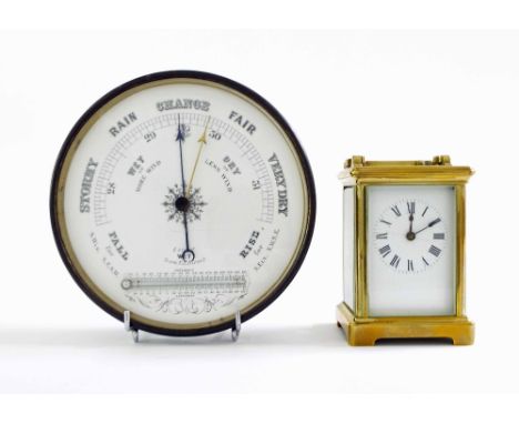 Carriage clock timepiece with R&C trademark to the back plate, within a brass case, 5" high, together with a circular baromet