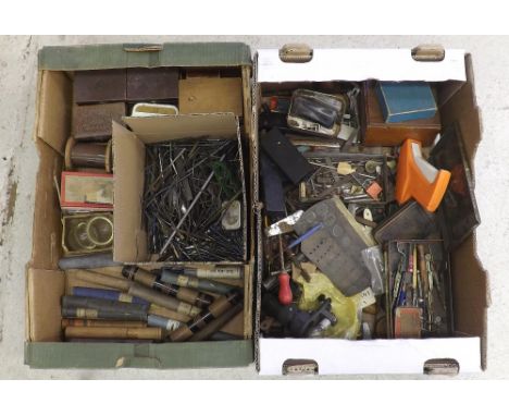 Assortment of tools from a watchmakers workshop, including blue pivot steel and brass pin wire