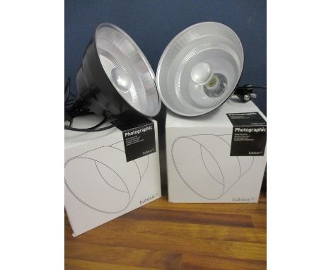 A pair of Habitat, boxed photographic lights in black, together with an anglepoise lamp 