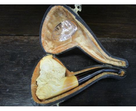 A cased Meerschaum tobacco pipe, the bowl carved in the form of an Arabs head, cased 