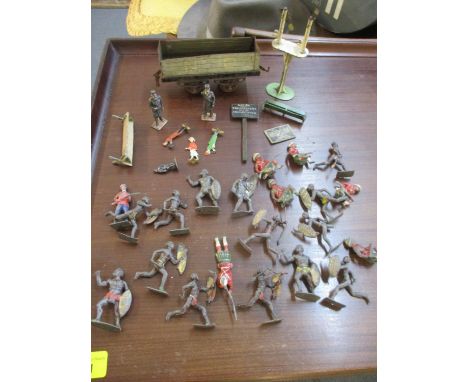A collection of vintage lead Zulu War soldiers and warriors, model railway accessories and a Hornby North Eastern open wagon 