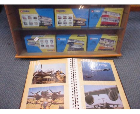 Six Corgi Classic vintage collectors die cast busses, together with a display case and an album of bus postcards 