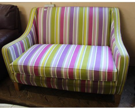 A modern Multiyork two seater sofa in bright striped upholstery