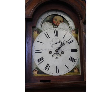 A mid Victorian mahogany cased eight day longcase clock with barley twist column supports,  painted dial with country house s