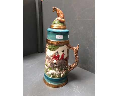 Pottery hunting jug and cover with fox finial