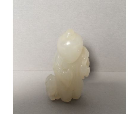 Chinese pale jade of a carving of a young boy 5cmH