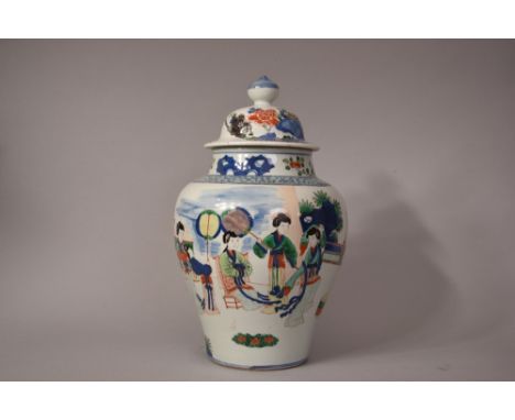 Kangxi-style Chinese famille verte baluster jar and cover decorated with courtier characters within a garden scene, 19th cent